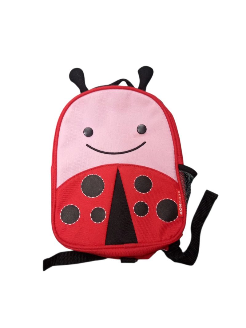 MOCHILA CHIQUITA CON ARNES DE MUÑECA SAN ANTONIO MANCHA TINTA INTERIOR