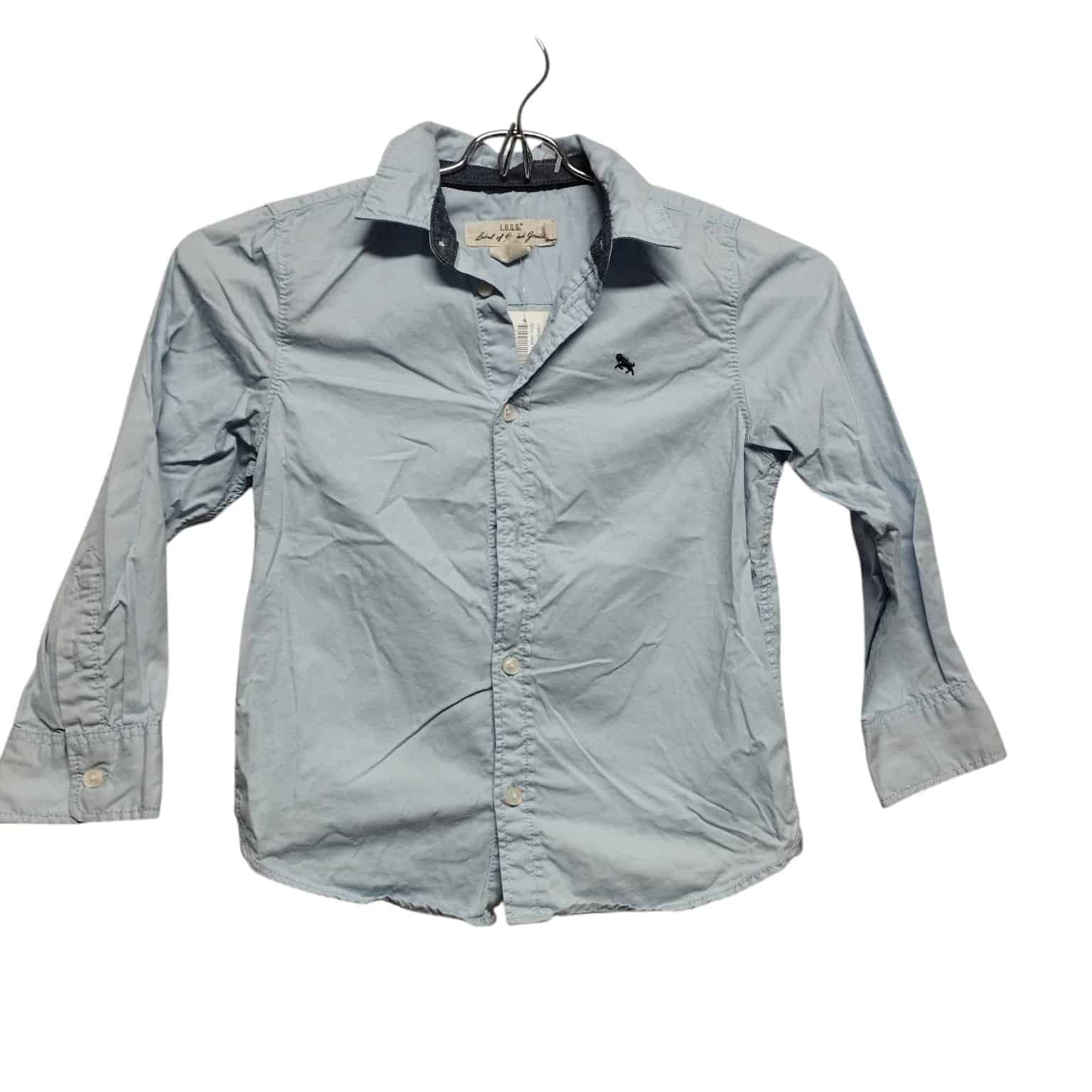 CAMISA CELESTE UNICORNIO BORDADO EN AZUL H&M T 5-6