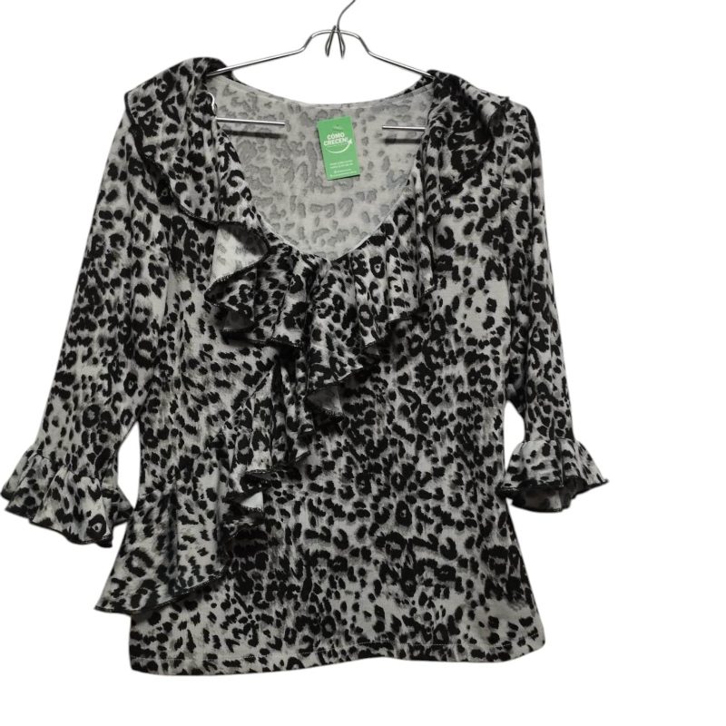 REMERA LANILLA ANIMAL PRINT VOLADOS T M APROX