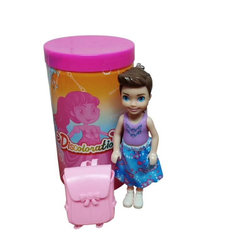 MUÑECA CHICA CON MOCHILA EN CILINDRO DISCOLORATION