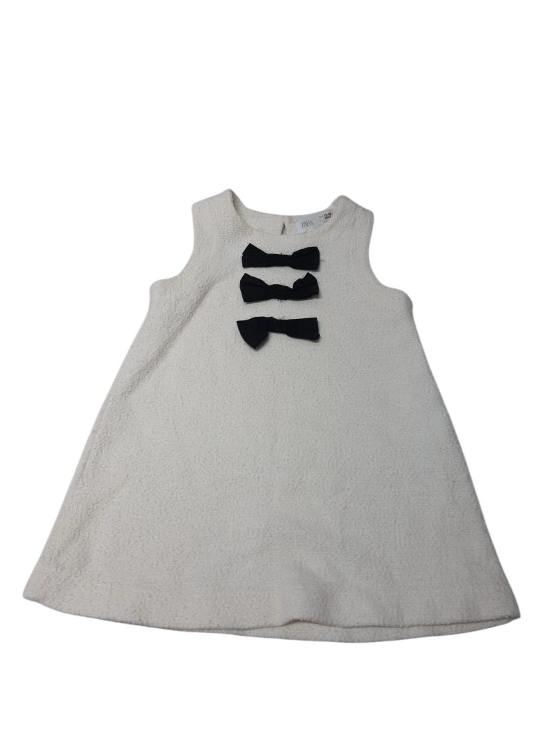 VESTIDO PLUSH BCO MOÑAS NEGRAS ZARA T12/18M