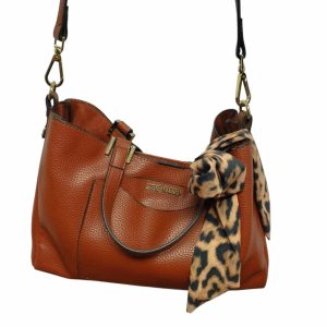 cartera steve madden marrón con dorado c necessaire dentro