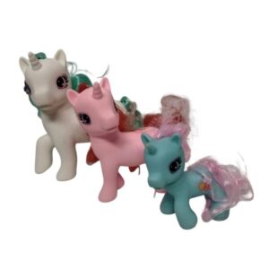 PONYS BLANCO ROSADO CELESTE PELO C BROCHES