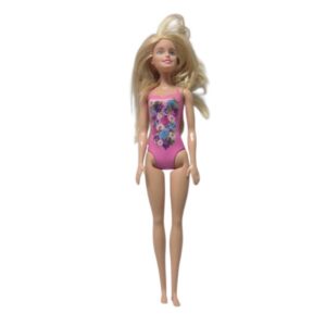 BARBIE CON MALLA FUCSIA FLORES RUBIA